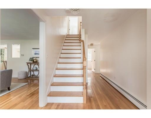 25 Twitchell Street Wellesley, MA 02482 - Photo 11 of 23 a view of entryway and hall with wooden floor