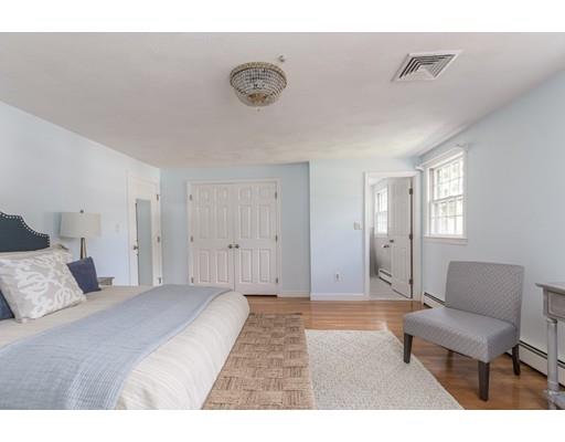 25 Twitchell Street Wellesley, MA 02482 - Photo 13 of 23 a bedroom with a bed and a couch
