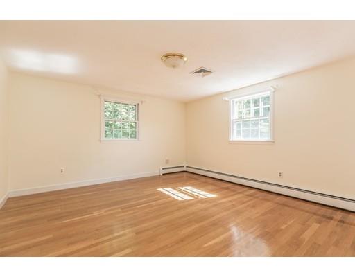 25 Twitchell Street Wellesley, MA 02482 - Photo 15 of 23 a view of an empty room with wooden floor and a window