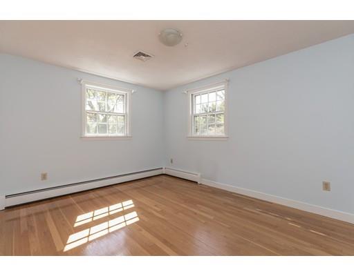 25 Twitchell Street Wellesley, MA 02482 - Photo 18 of 23 a view of an empty room with wooden floor and a window