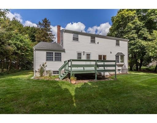 25 Twitchell Street Wellesley, MA 02482 - Photo 21 of 23 a front view of a house with a garden