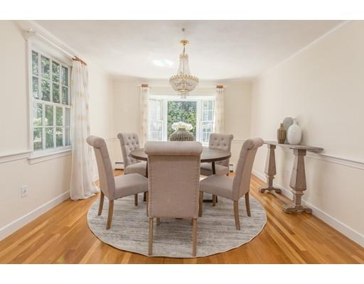 25 Twitchell Street Wellesley, MA 02482 - Photo 4 of 23 a dining room with furniture a chandelier and wooden floor