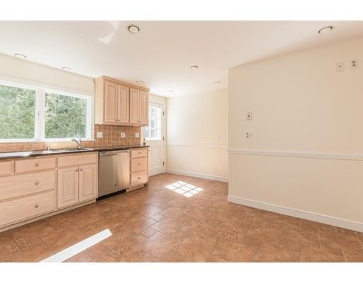 25 Twitchell Street Wellesley, MA 02482 - Photo 6 of 23 a kitchen with a white cabinets and white appliances
