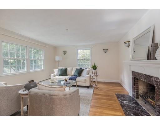 25 Twitchell Street Wellesley, MA 02482 - Photo 7 of 23 a living room with furniture a fireplace and a large window