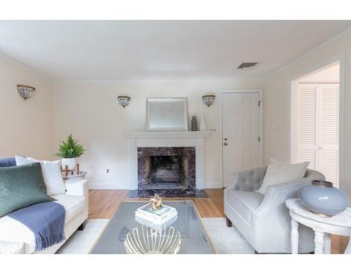 25 Twitchell Street Wellesley, MA 02482 - Photo 8 of 23 a living room with furniture and a fireplace