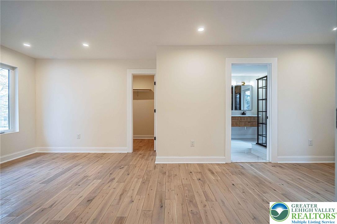 300 Witmer Road Horsham, PA 19044 - Photo 27 of 50 an empty room with wooden floor and windows