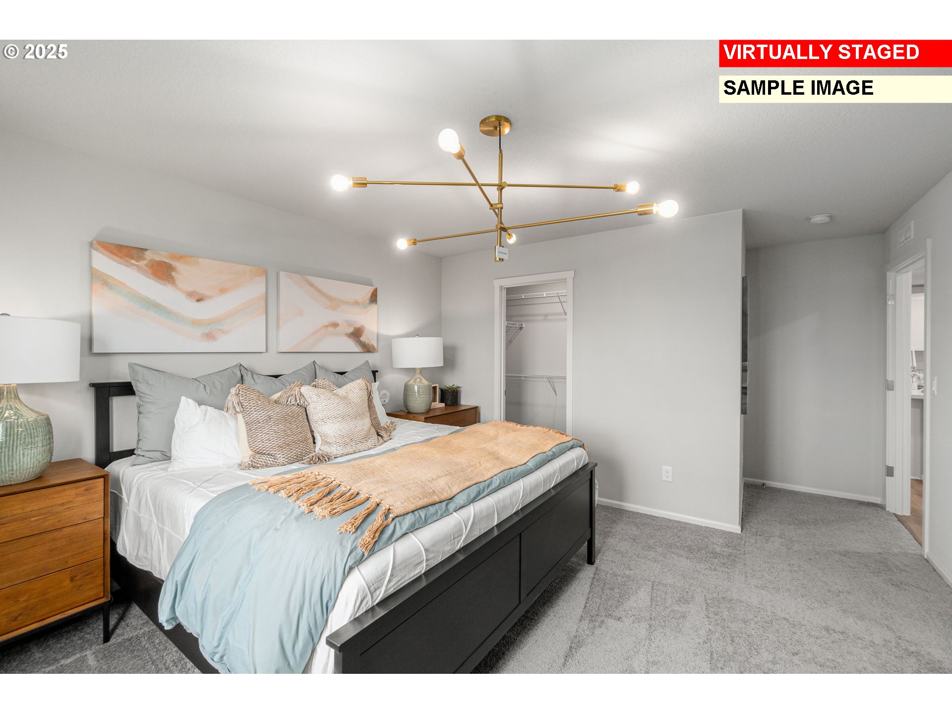 1074 Clemson Street Gervais, OR 97026 - Photo 11 of 18 a bedroom with a bed and a chandelier