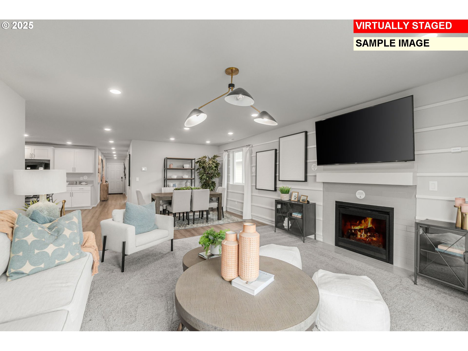 1074 Clemson Street Gervais, OR 97026 - Photo 6 of 18 a living room with furniture a fireplace and flat screen tv