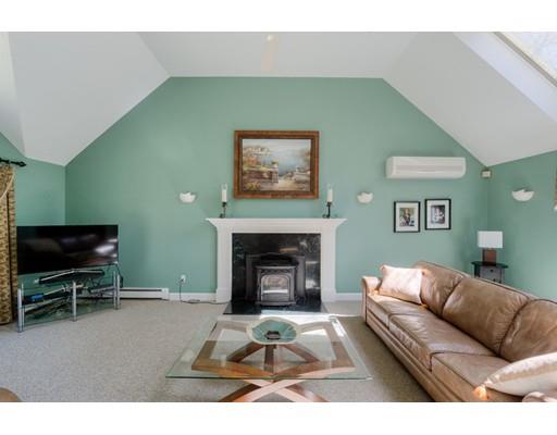 47 Sterling Road Holden, MA 01522 - Photo 9 of 27 a living room with furniture and a fireplace