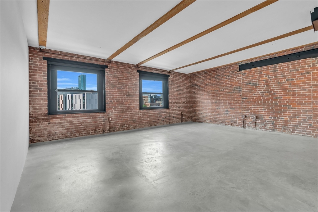90 Wareham Street, Unit 505 Boston, MA 02118 - Photo 4 of 11 a view of an empty room with a window