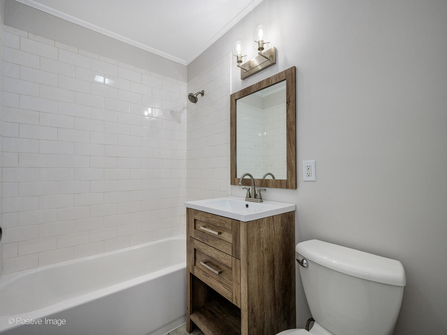 353 Blackhawk Drive Park Forest, IL 60466 - Photo 11 of 15 a bathroom with a toilet a sink and bathtub