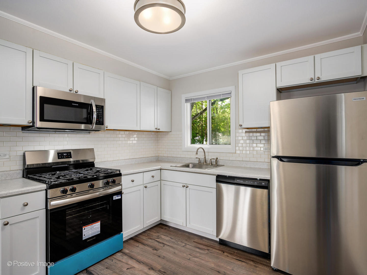 353 Blackhawk Drive Park Forest, IL 60466 - Photo 8 of 15 a kitchen with a refrigerator stove and microwave