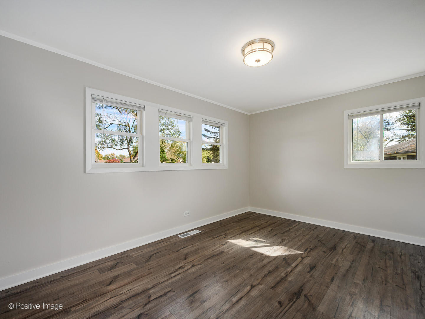 353 Blackhawk Drive Park Forest, IL 60466 - Photo 10 of 15 a view of empty room with wooden floor and window
