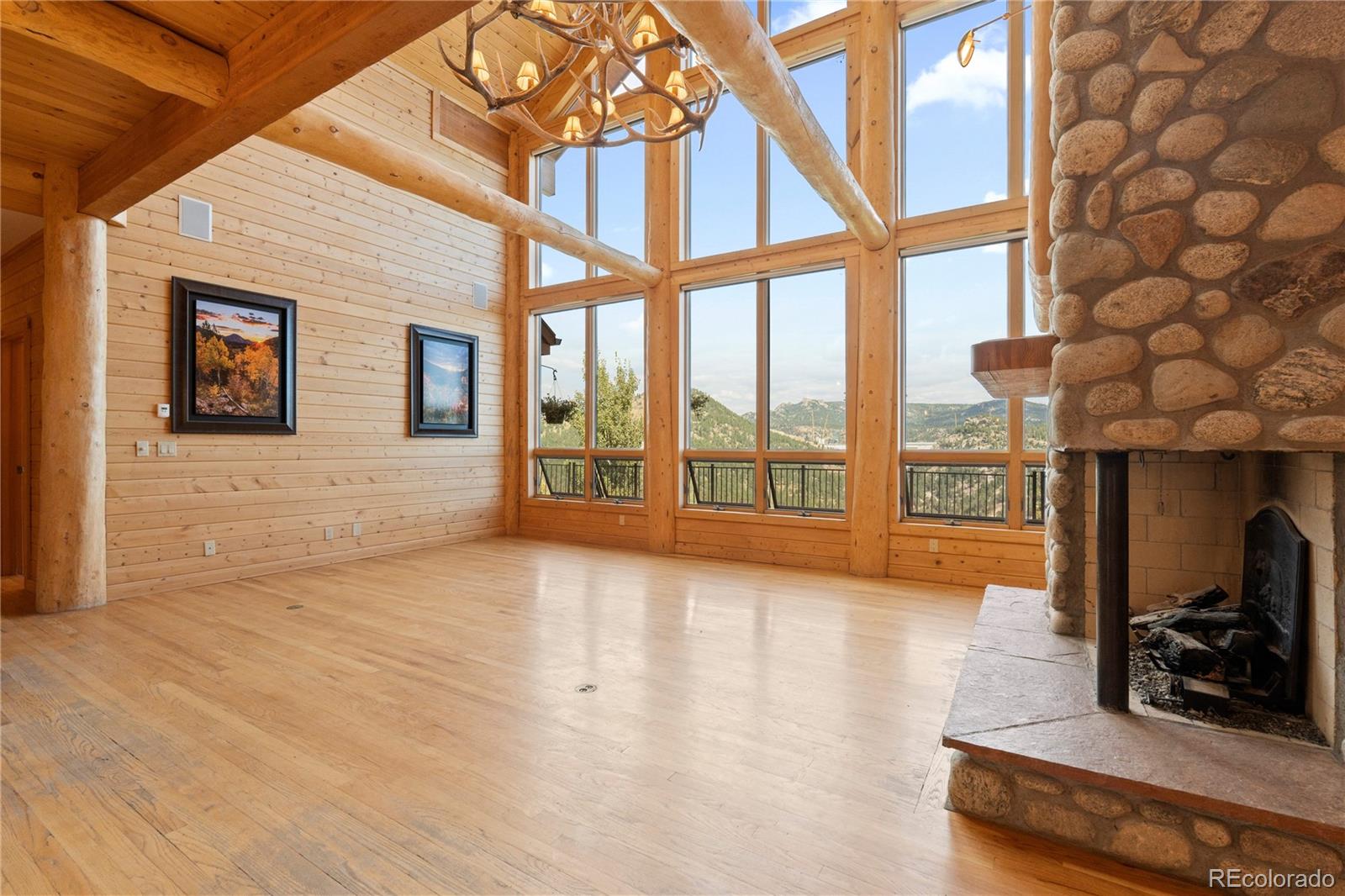 2489 Gross Dam Road Golden, CO 80403 - Photo 11 of 47 a view of an entryway with a floor to ceiling window