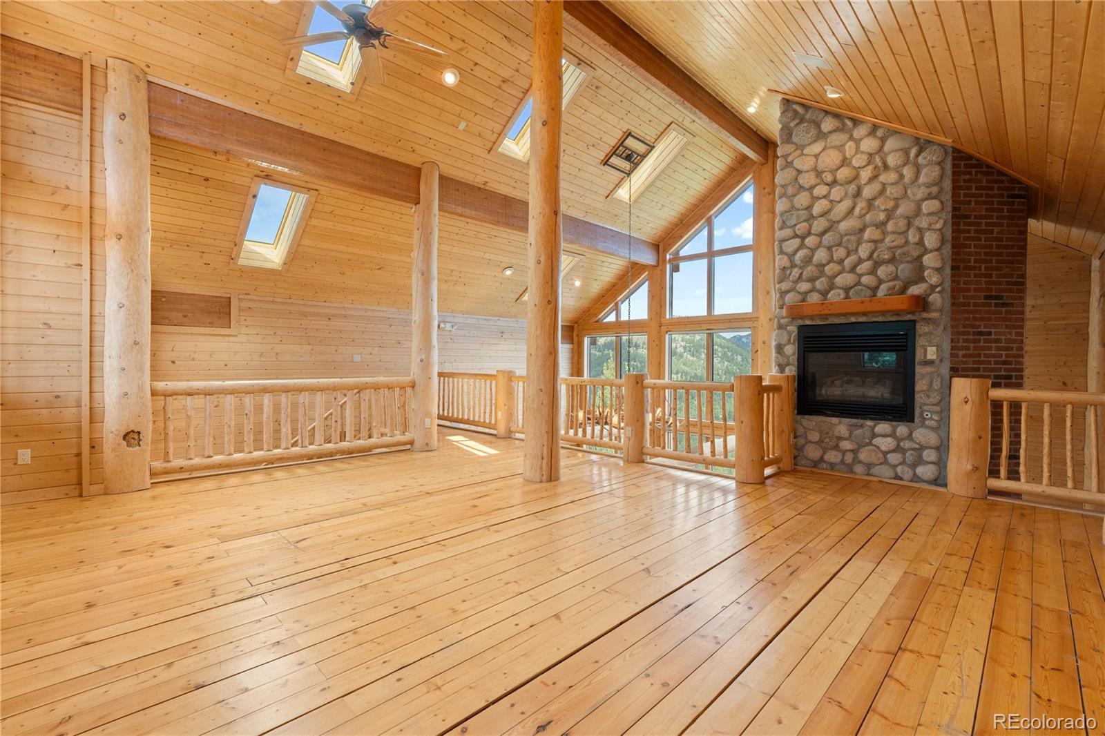 2489 Gross Dam Road Golden, CO 80403 - Photo 20 of 47 a view of an entryway with wooden floor