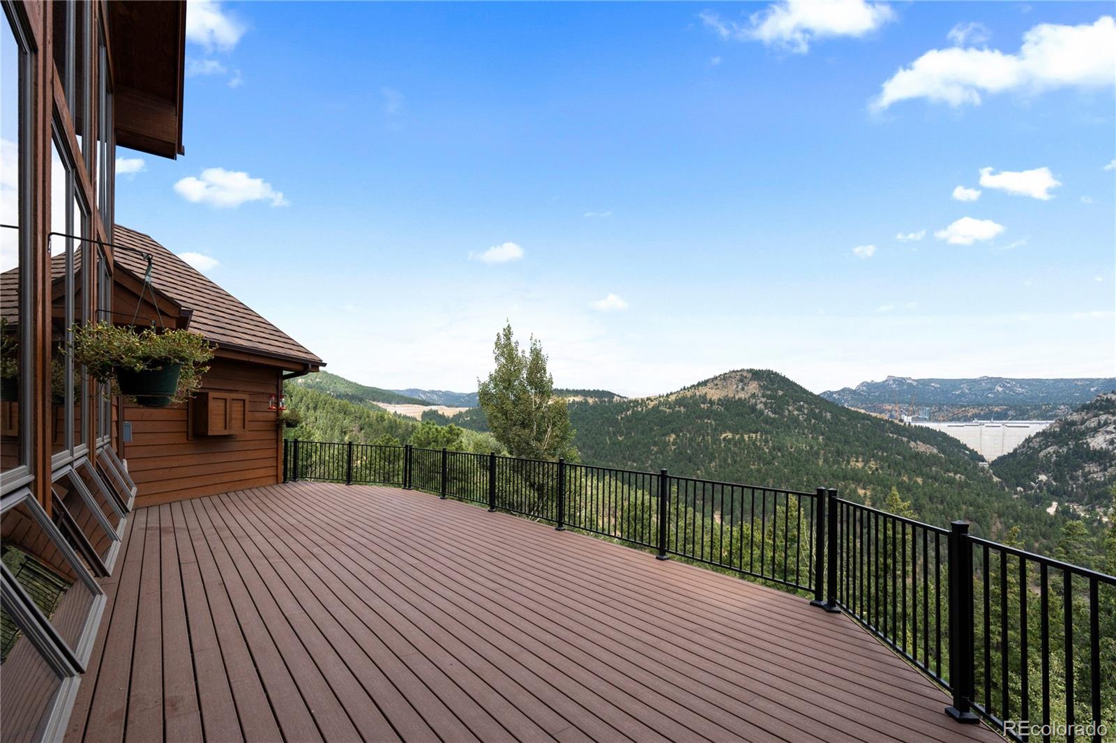 2489 Gross Dam Road Golden, CO 80403 - Photo 3 of 47 a view of a house with a balcony