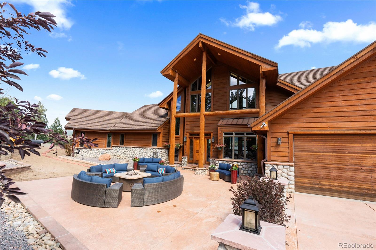 2489 Gross Dam Road Golden, CO 80403 - Photo 42 of 47 a front view of a house with patio