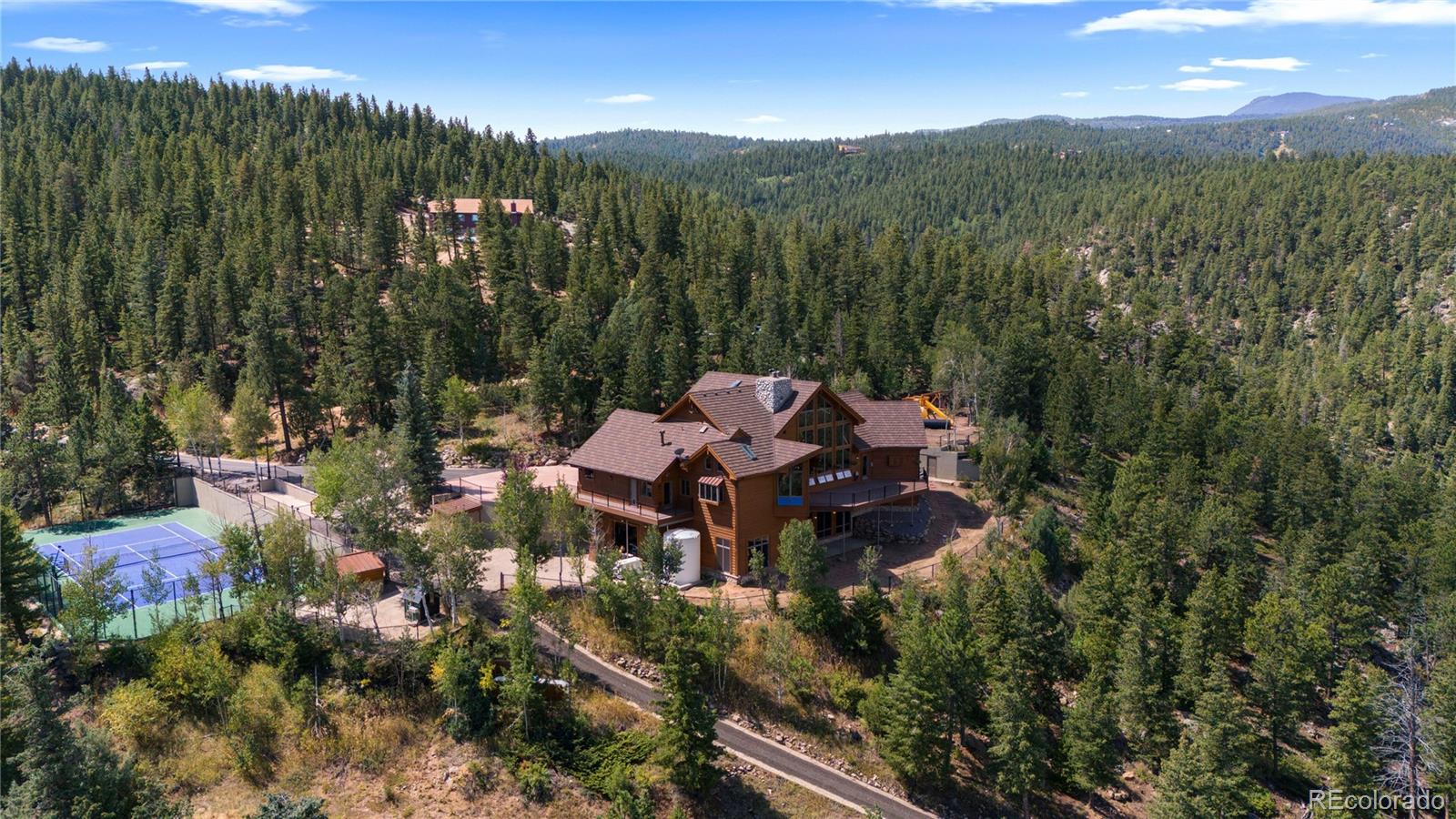 2489 Gross Dam Road Golden, CO 80403 - Photo 46 of 47 a view of a city with lush green forest