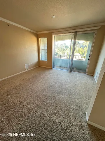 a bathroom with a tub and shower