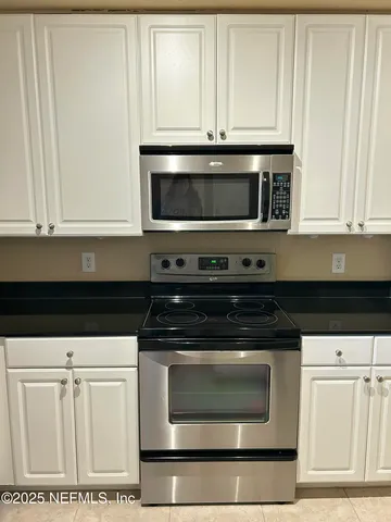 a utility room with washer and dryer