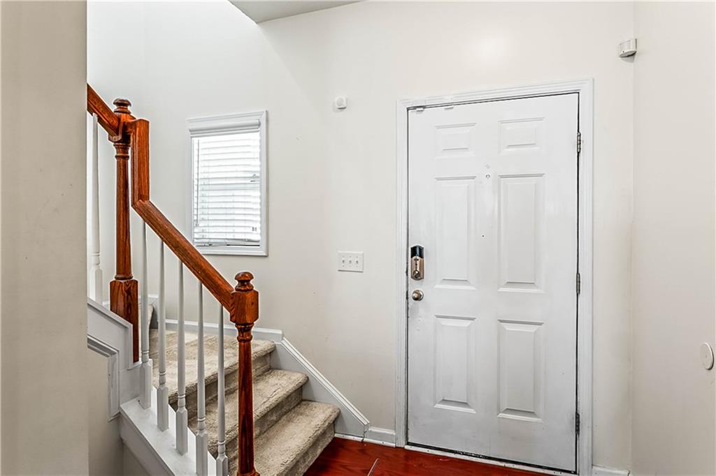 2555 Flat Shoals Road, Unit 2006 Atlanta, GA 30349 - Photo 4 of 29 a view of an entryway with staircase