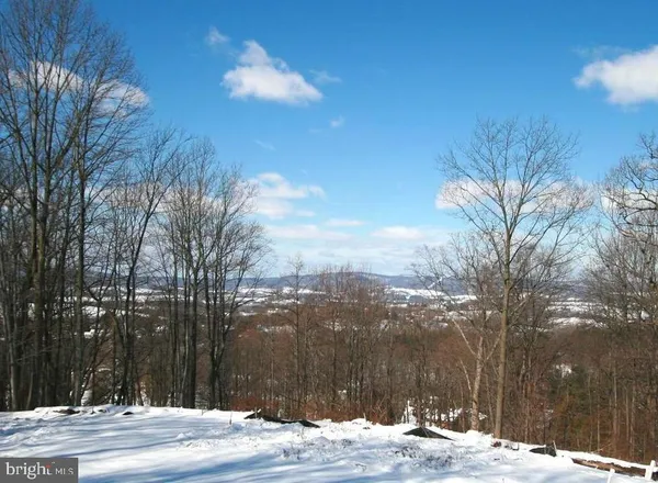 a view of a house with a snow