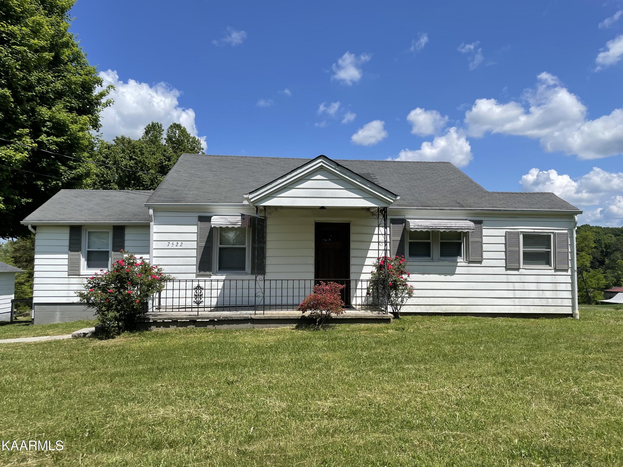 7522 Clapps Chapel Road Corryton, TN 37721 - Photo 1 of 12 a front view of a house with garden