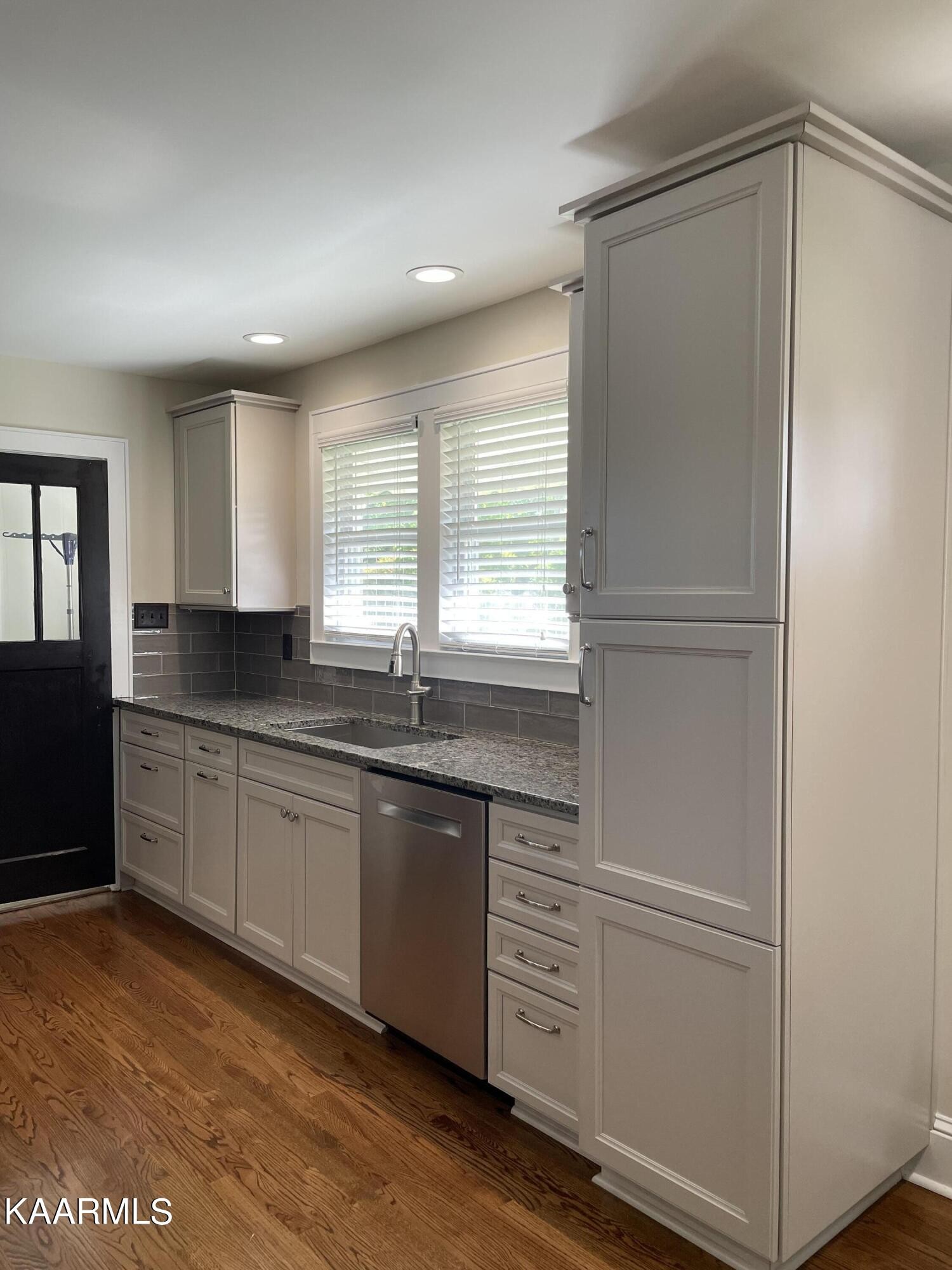 7522 Clapps Chapel Road Corryton, TN 37721 - Photo 7 of 12 a kitchen with a sink and cabinets