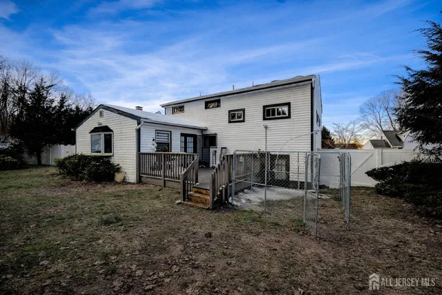 a view of backyard with green space