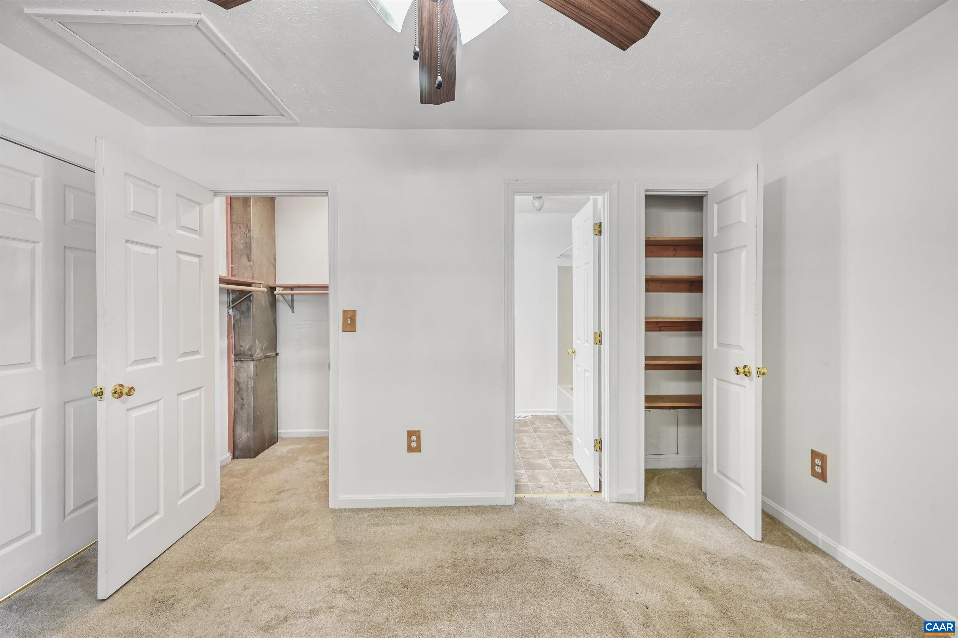2445 Eastham Road Bumpass, VA 23024 - Photo 24 of 29 an empty room with closet and windows
