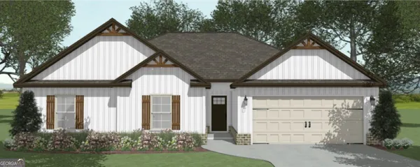 a front view of house with a garden