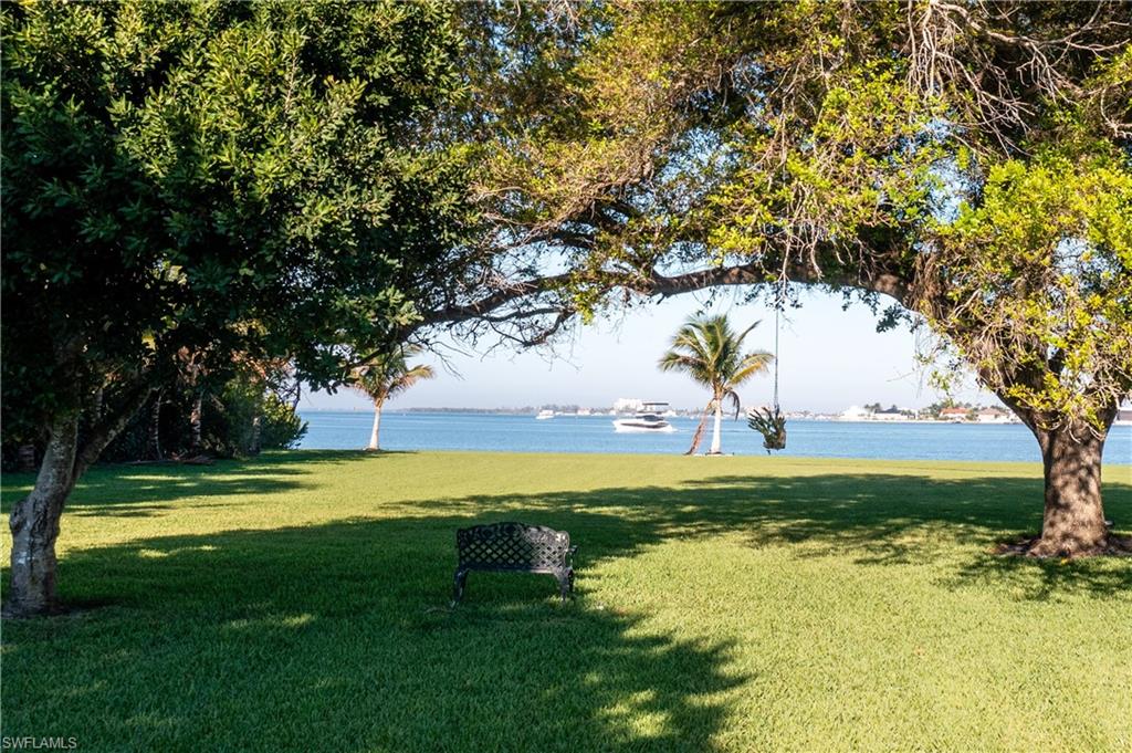 14040 Schultz Road Fort Myers, FL 33908 - Photo 8 of 12 a view of a golf course with a lake view