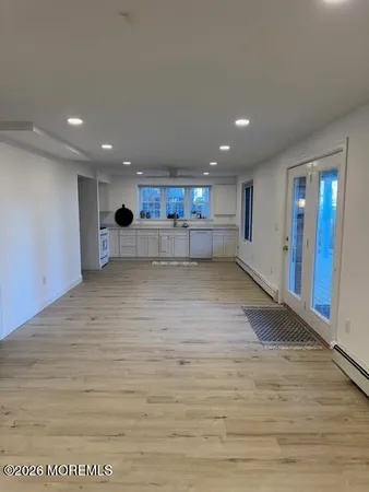 a view of a kitchen with a sink