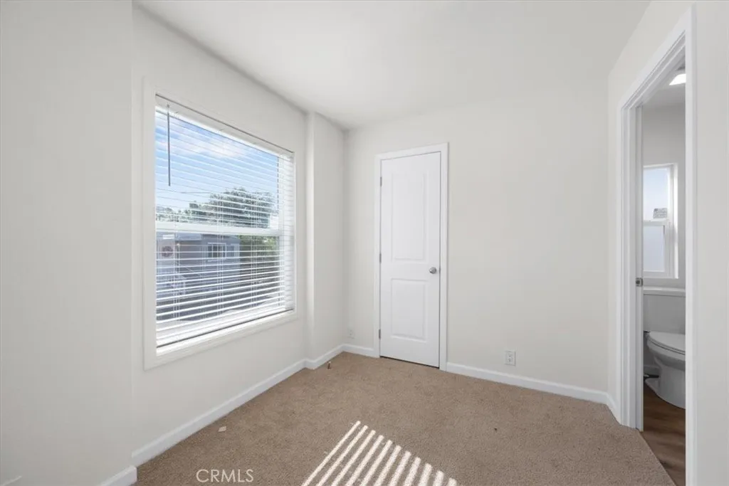 1255 Orcutt Road, Unit B27 San Luis Obispo, CA 93401 - Photo 13 of 24 a view of an empty room with a window