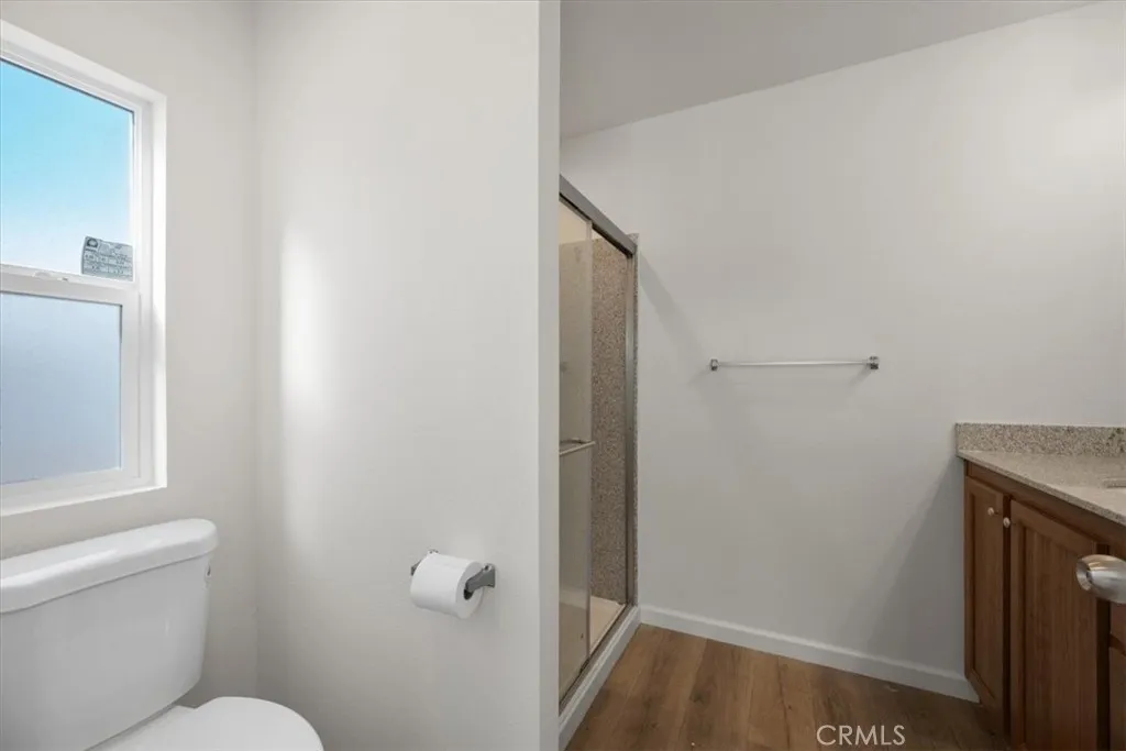 1255 Orcutt Road, Unit B27 San Luis Obispo, CA 93401 - Photo 16 of 24 a bathroom with a granite countertop toilet and a sink