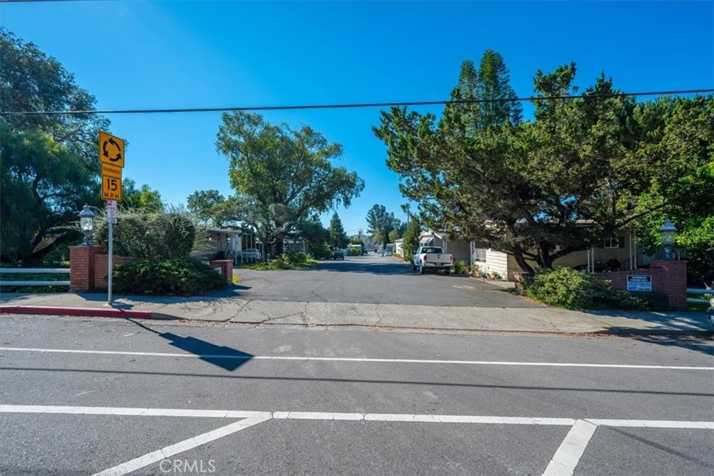 1255 Orcutt Road, Unit B27 San Luis Obispo, CA 93401 - Photo 24 of 24 a view of a yard with a house in the background