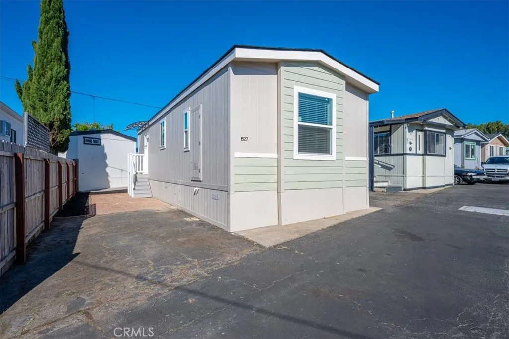 1255 Orcutt Road, Unit B27 San Luis Obispo, CA 93401 - Photo 5 of 24 a view of a house with a yard