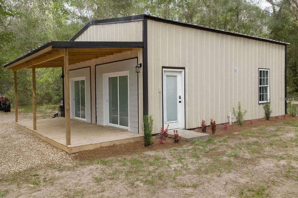 401 Kemp Road, Unit SUITE B Lake City, FL 32024 - Photo 1 of 13 a view of a house with backyard