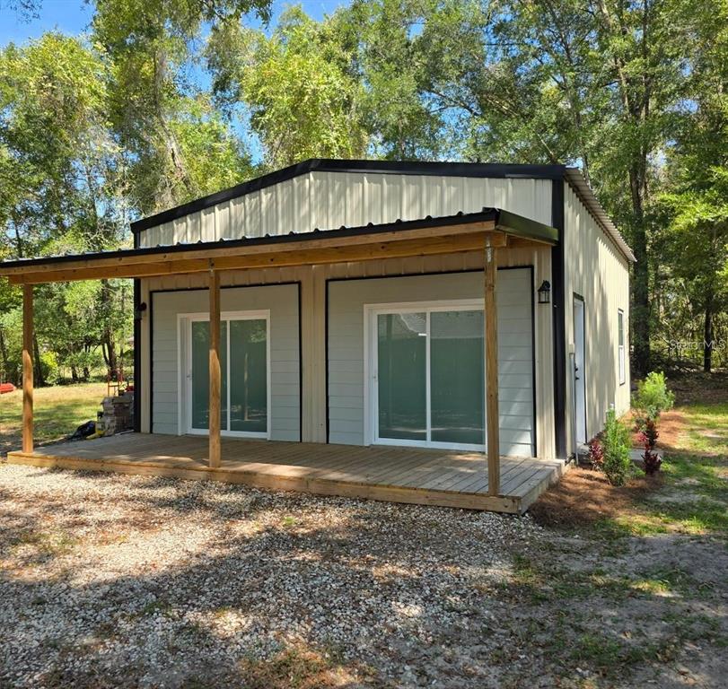 401 Kemp Road, Unit SUITE B Lake City, FL 32024 - Photo 13 of 13 a front view of a house with a yard