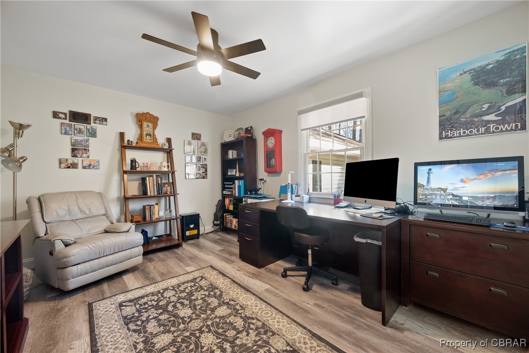 867 Holly Point Road Mathews, VA 23109 - Photo 19 of 48 Home office featuring ceiling fan and light hardwood / wood-style floors