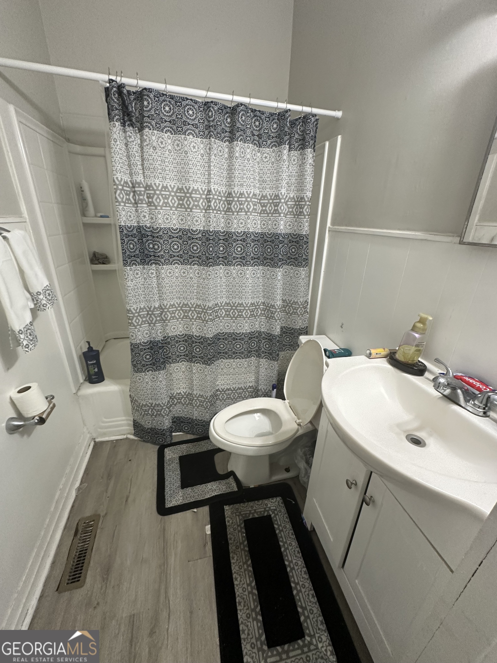 193 Frazier Drive Southeast Milledgeville, GA 31061 - Photo 26 of 38 a bathroom with a sink a toilet and shower