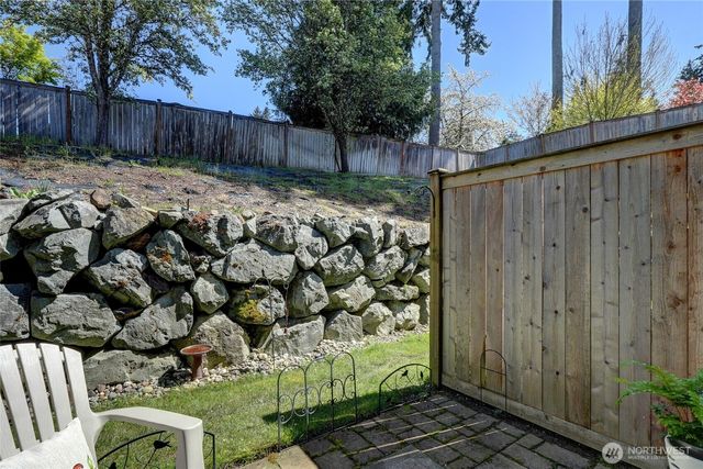 a front view of a house with glass windows