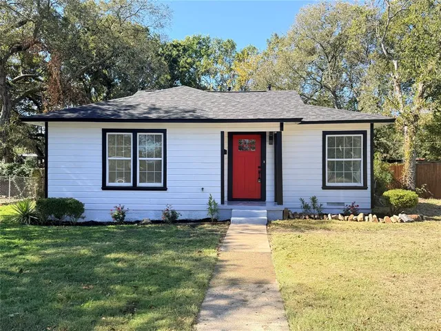 a front view of house with yard