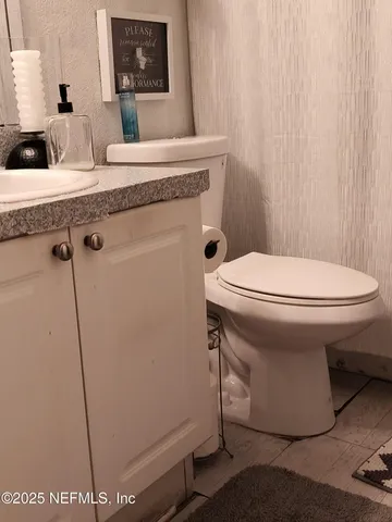 a bathroom with a sink and a toilet