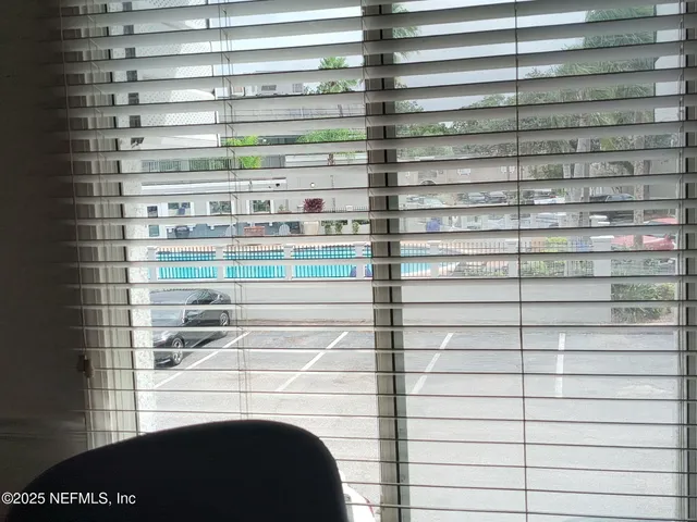 a picture of a bathroom with a shower