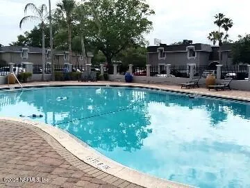a view of a lake with a house