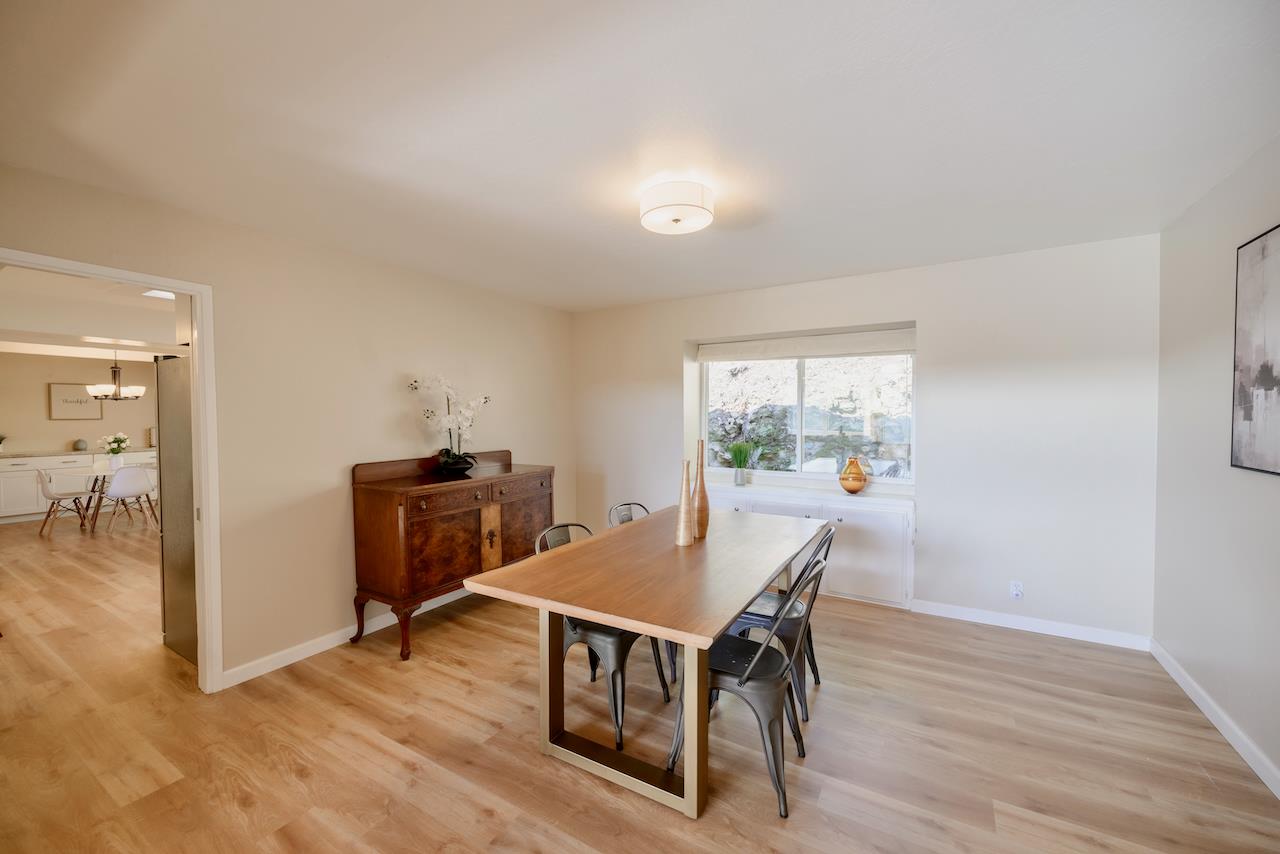 155 Rabbits Run Road Santa Cruz, CA 95060 - Photo 11 of 113 a view of a dining room with furniture window and wooden floor
