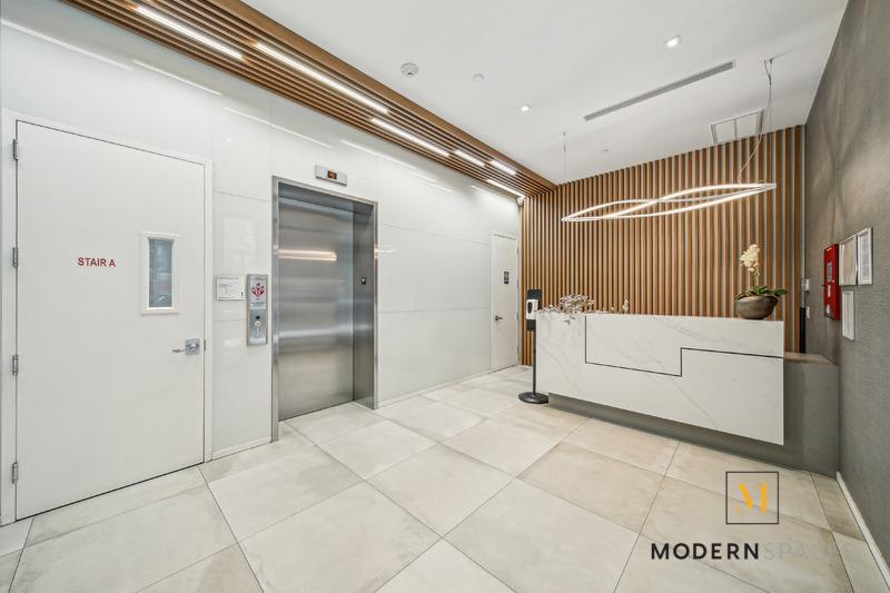 24-12 42nd Road, Unit 4A Queens, NY 11101 - Photo 14 of 17 a view of a hallway with entryway