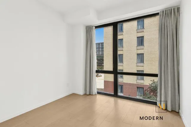 an empty room with windows