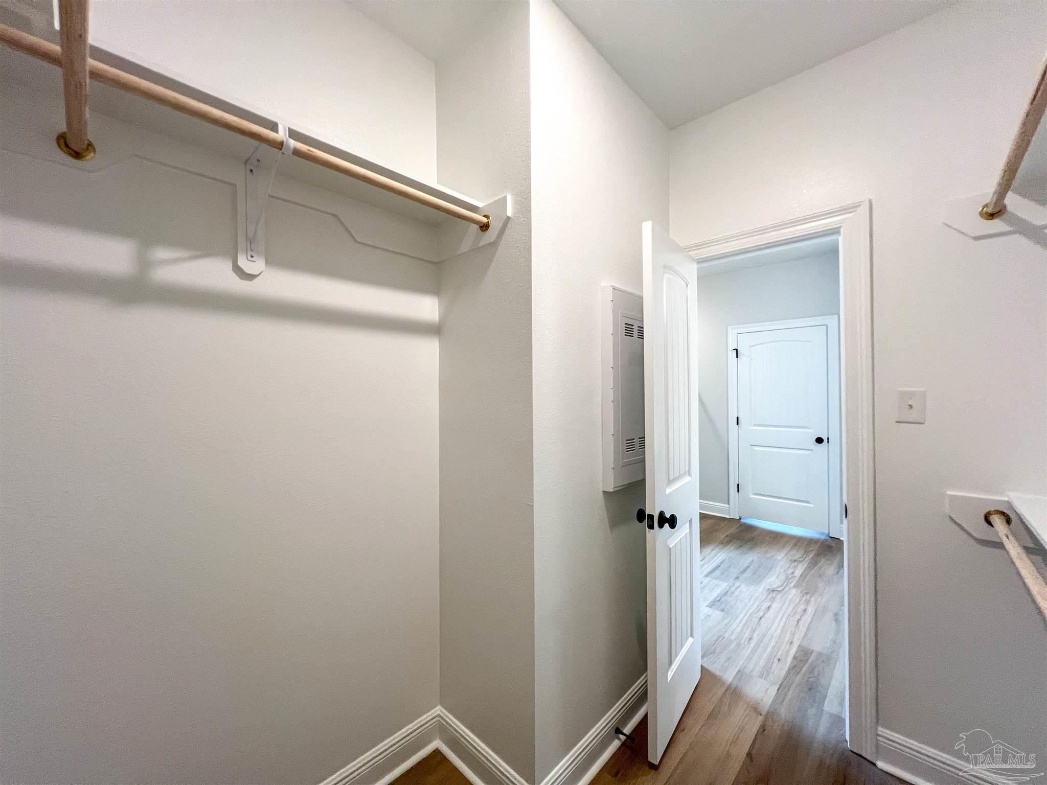 4605 Sago Palm Circle Milton, FL 32571 - Photo 20 of 33 a view of a room with wooden floor